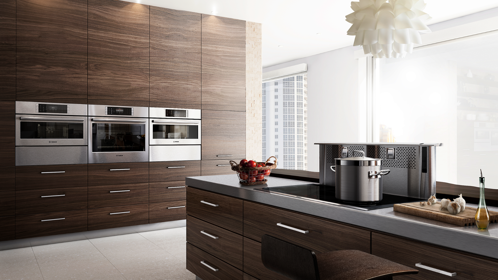 Bosch stainless-steel ovens in a contemporary kitchen with wood cabinetry and an island cooktop.
