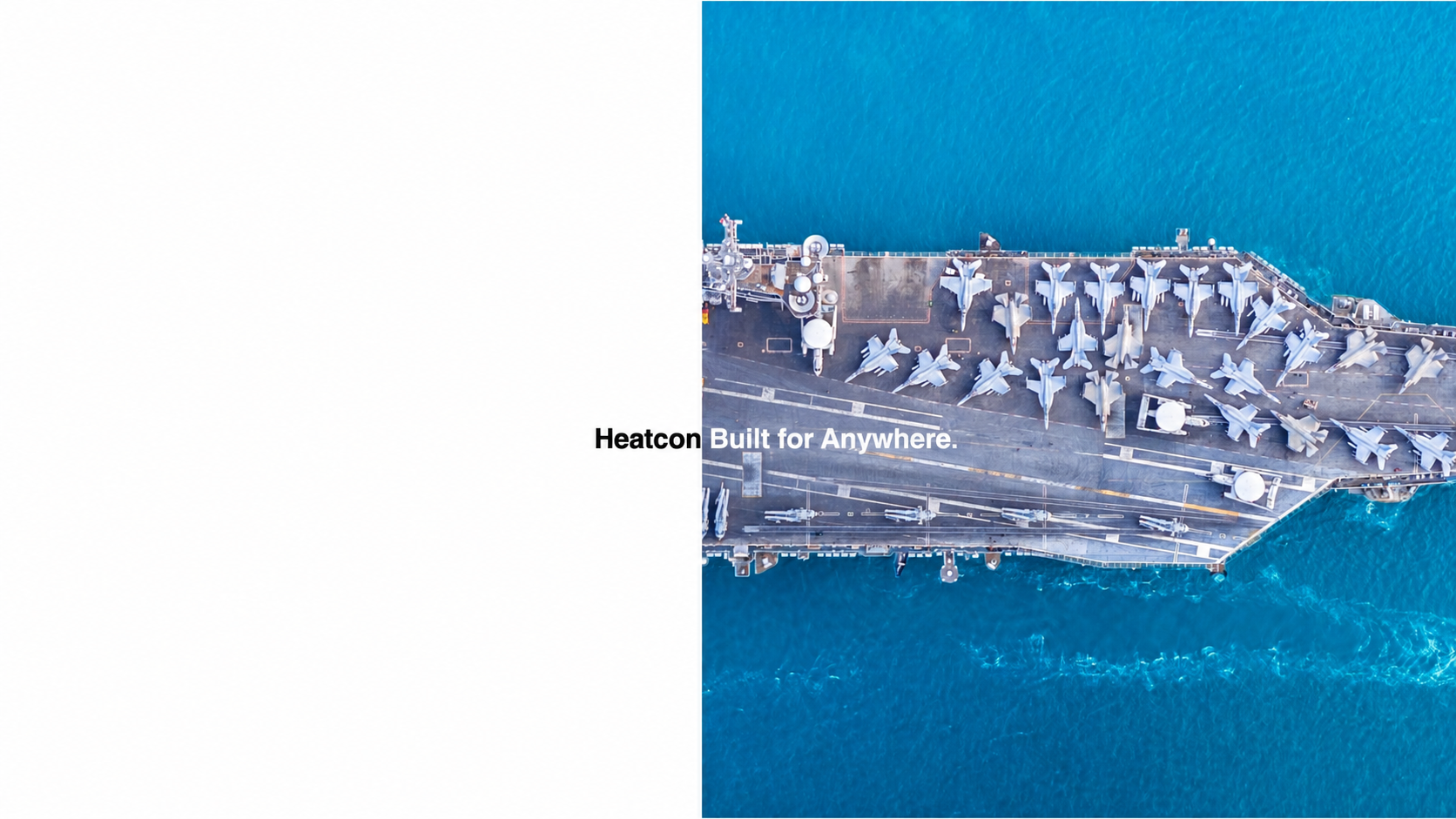 An overhead view of an aircraft carrier at sea beside the Heatcon Built for Anywhere campaign headline.